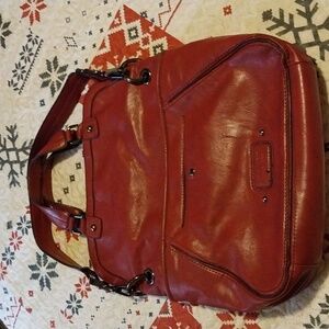 Large Nine West red leather shoulder bag/clutch.